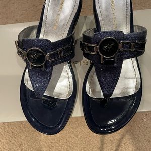 Metallic blue Marc Fisher thong sandals.